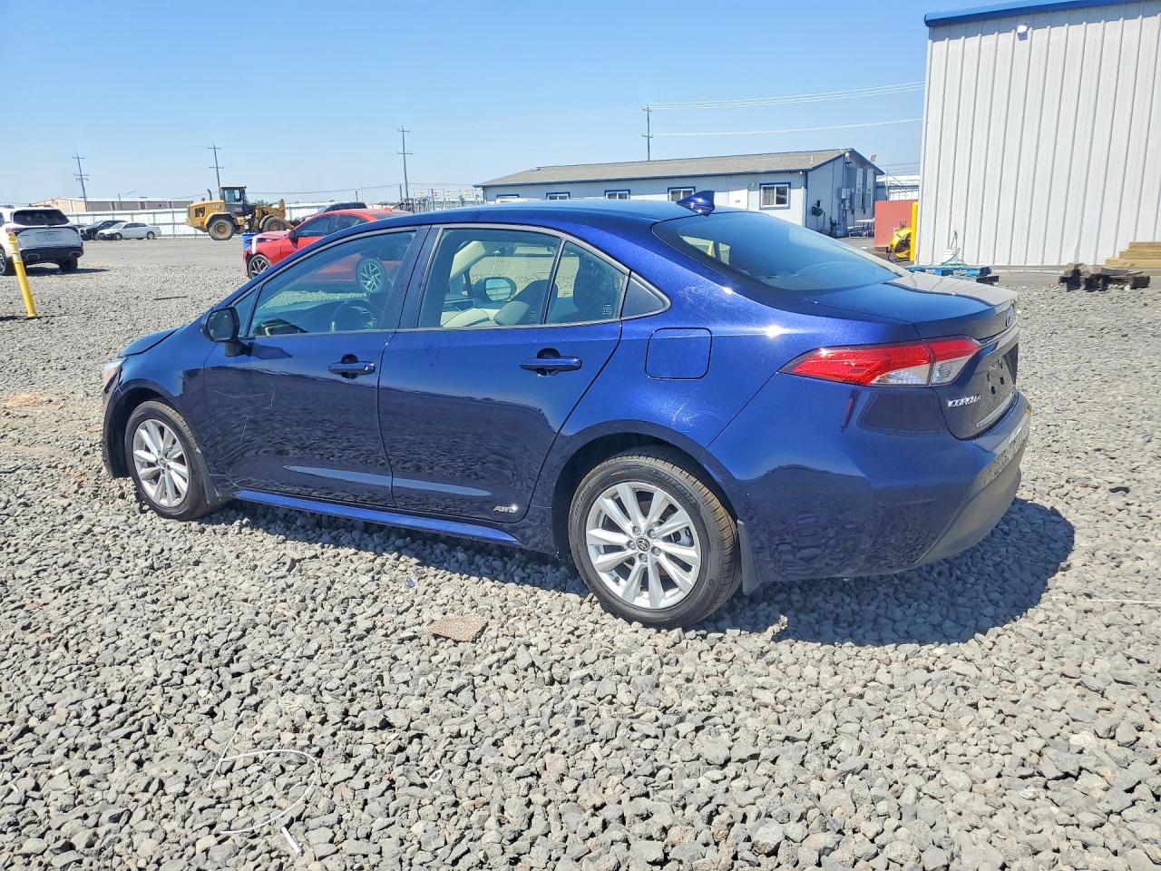 2025 TOYOTA COROLLA HYBRID, VIN JTDBDMHE3S3016604 — Photo 2